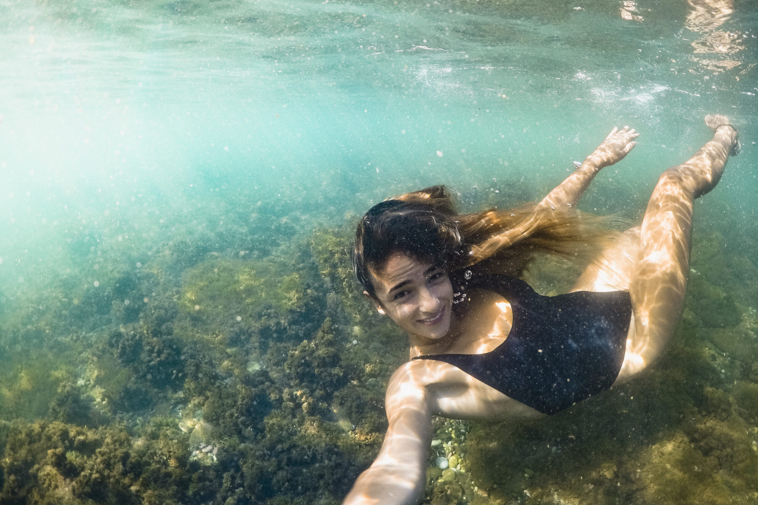 Actividades al aire libre, como buceo, snorkel y deportes acuáticos en Cancún